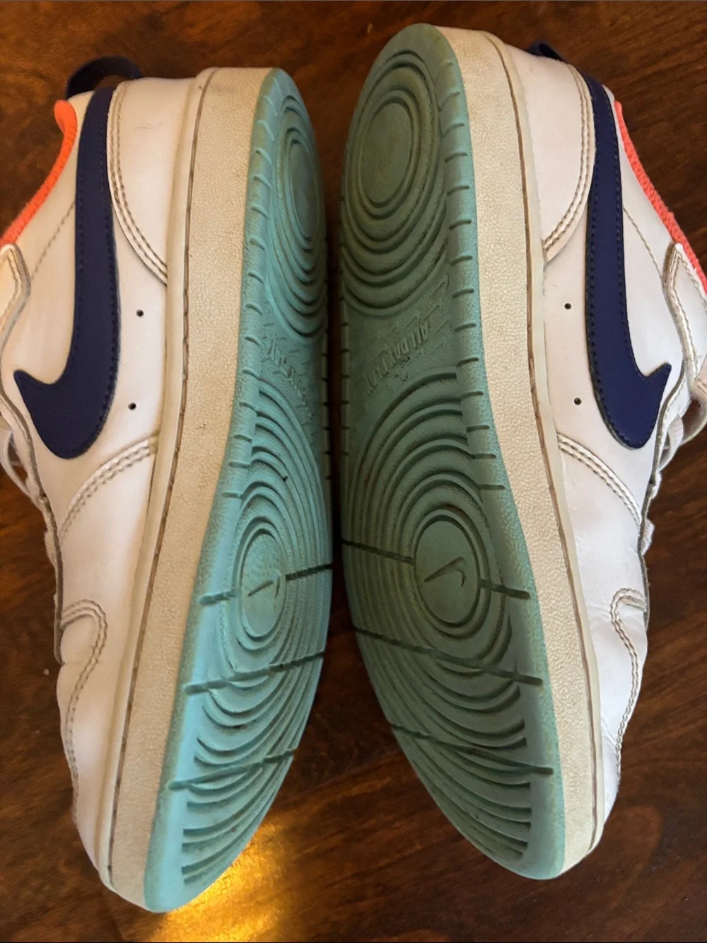 Nike Kids White Sneakers with Blue Swoosh and Orange Lining